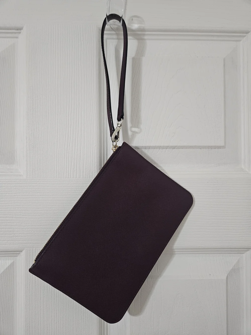 kate spade burgundy wristlet with gold hardware